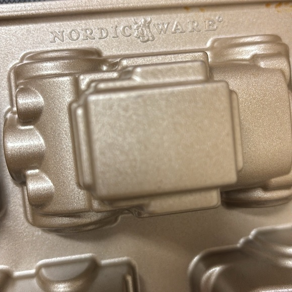 Practically new  Nordic Ware baking mold of eight mini car shapes. - Picture 7 of 7